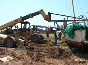 Lifting boat back on to trailer.